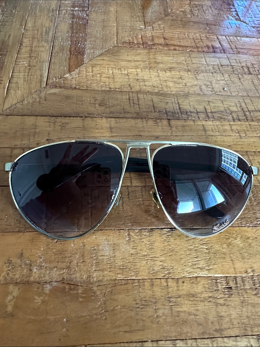 Gucci GG0502S Gold Frame Aviator Sunglasses with Gradient Black Lenses